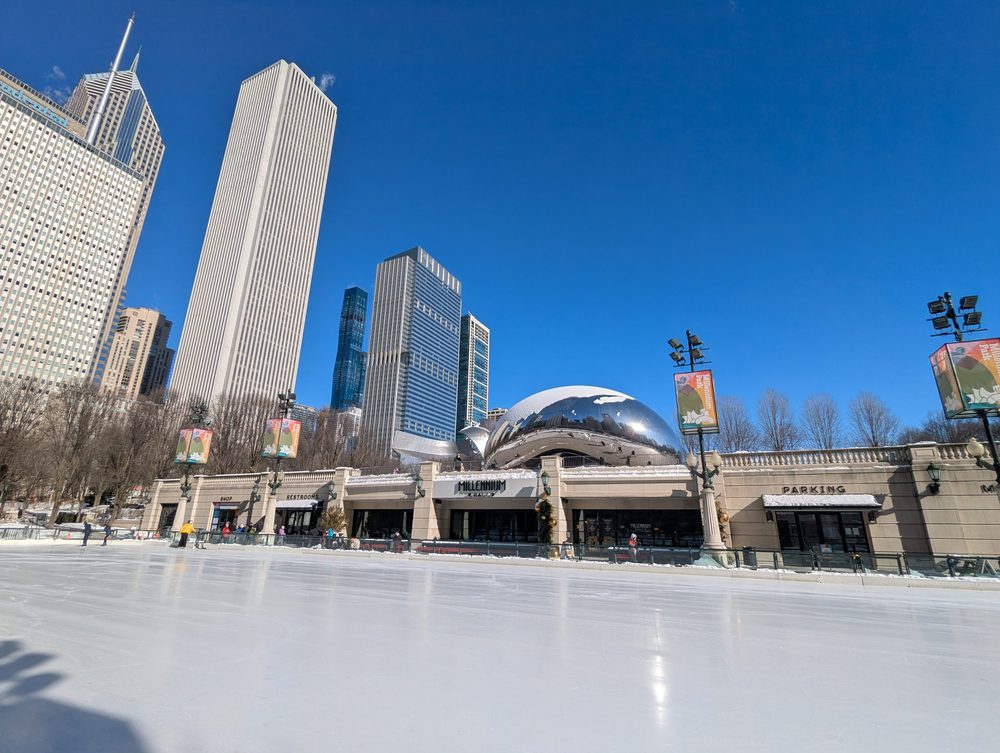 The ice rink in Millennium Park with the Bean behind it