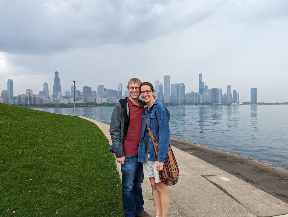Luke and Katelyn on the lakefront path with the Chicago skyline behind them